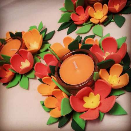 alt="centrotavola-decorativo-fiori-in-crepla-tea-light"